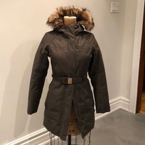 North Face Parka with hood and belt.